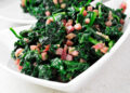 closeup of a bowl with spanish espinacas con jamon, spinach with ham